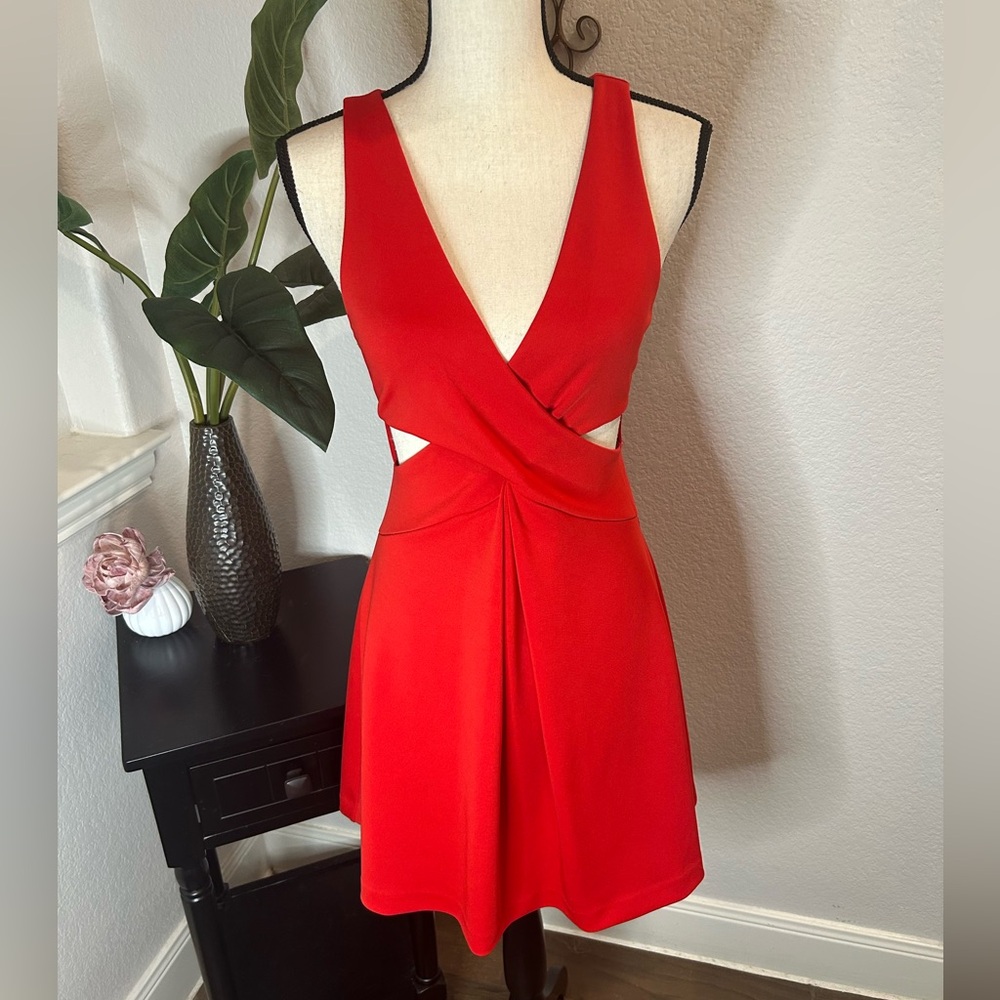 Express scarlet size 4 dress with cutouts. Perfect for Valentine’s Day! In EUC!!